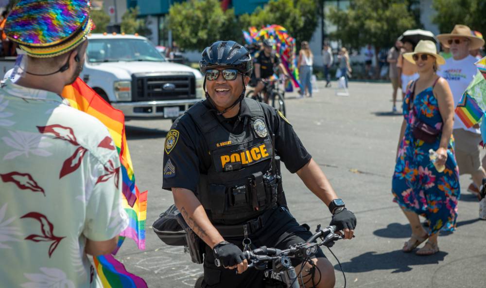 Officer participating in Pride Parade Officer participating in Pride Parade