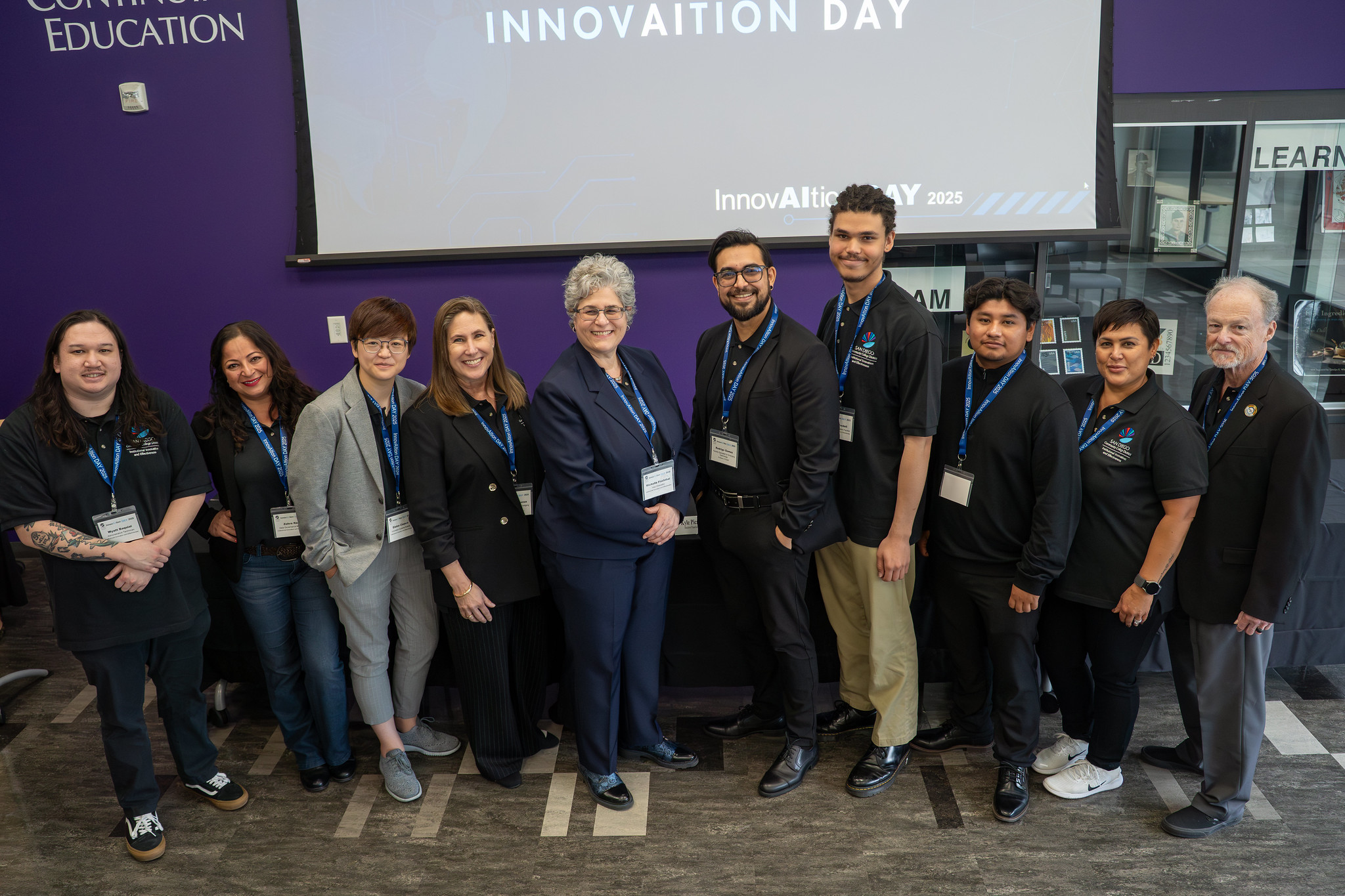 Six employees celebrate a Black History Month event