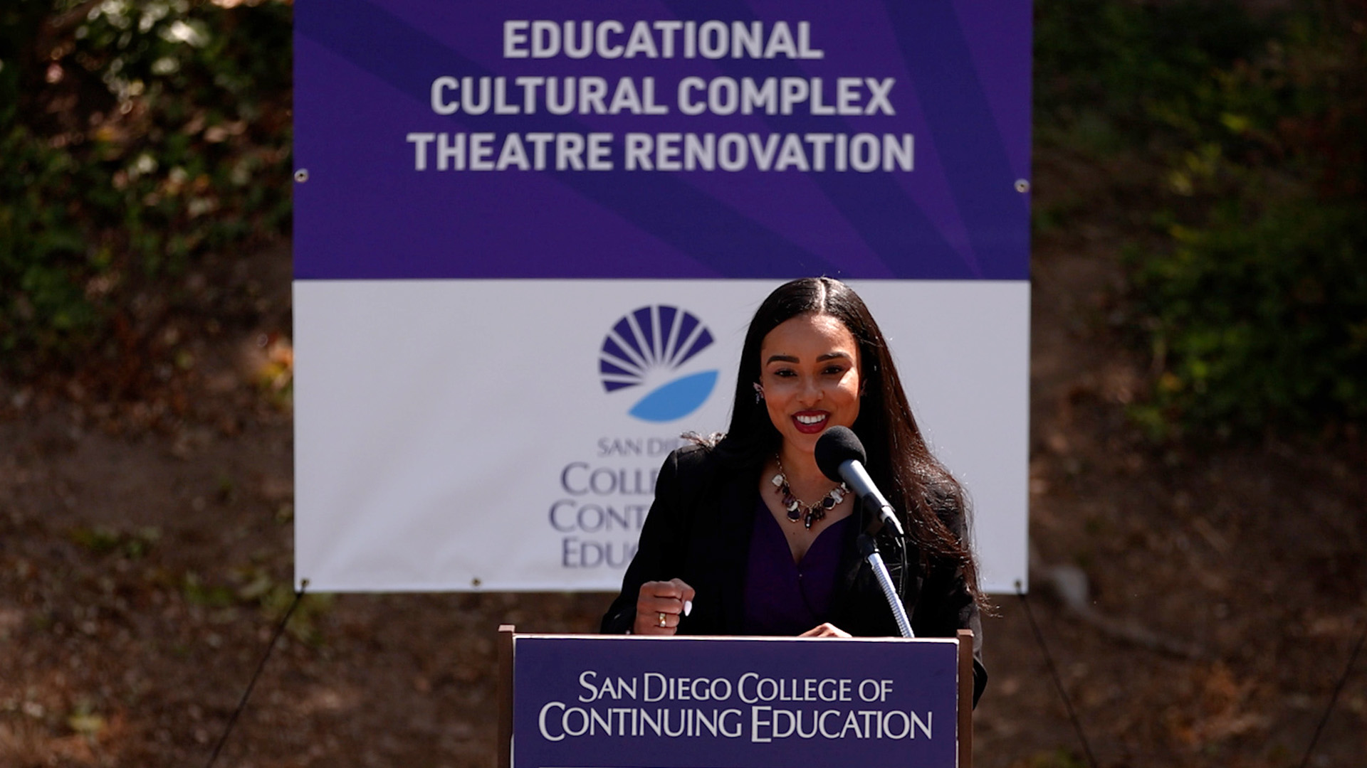 President Tina King speaks at a podium at the groundbreaking