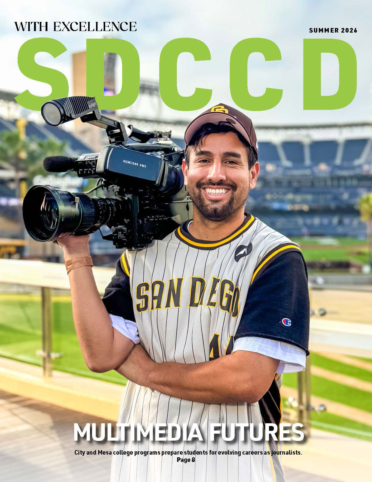 Cover of WE Magazine shows David Pradel wearing a Padres jersey and hat holding a professional video camera on his shoulder with Petco Park in the background.